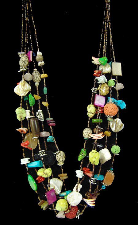 Treasure Necklace: Early 2000s, Colorful five-strand "treasure" necklace with fetishes, shells, beads, gemstones, etc. Very good condition. 24"