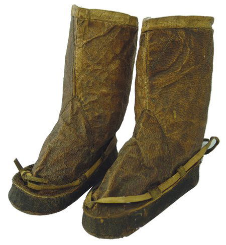 Eskimo Child's Mukluks: Late 1800s, Very rare pair of intact child's sealskin boots with amazing patina. Very good condition. 7" tall x 5"