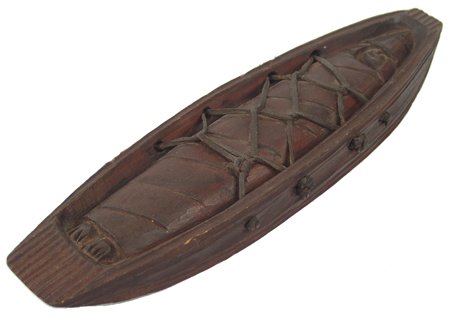 Salish Model Cradle: Early 1900s, Rare hand carved model cedar baby carrier with dark finish and thong lacing. Very good condition. 1-1/2" x 15" x 5"