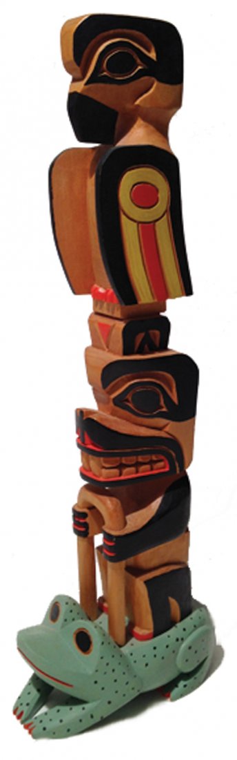 NW Coast Totem Pole: Ca. 1958, Great hand carved 3-figure cedar pole depicting a frog, beaver, and eagle. 18" x 3-1/4"