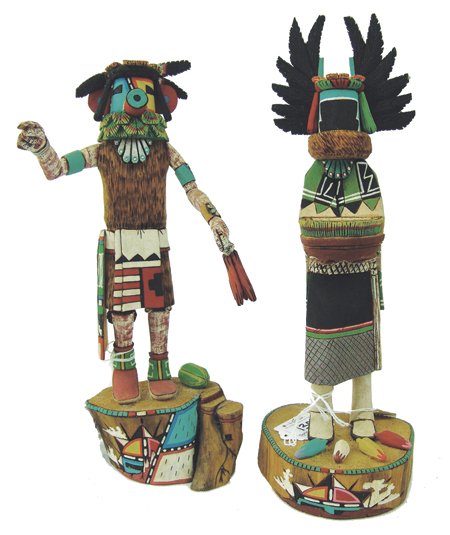 2 Hopi Kachina Carvings - Alton Pashano: Late 1900s, Two very fine, one-piece style examples, the taller "Crow Mother," the other "Meator Crater." Both in very good condition with minor repairs, one is missing a feather. 12-1/2" and 11-1/2"