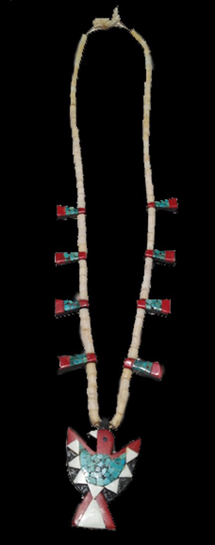 Pueblo Necklace: Ca. 1940, Turquoise mosaic eagle pendant and blossoms with coral and shell on old battery casing backings, strung on shell heshi. 31"
