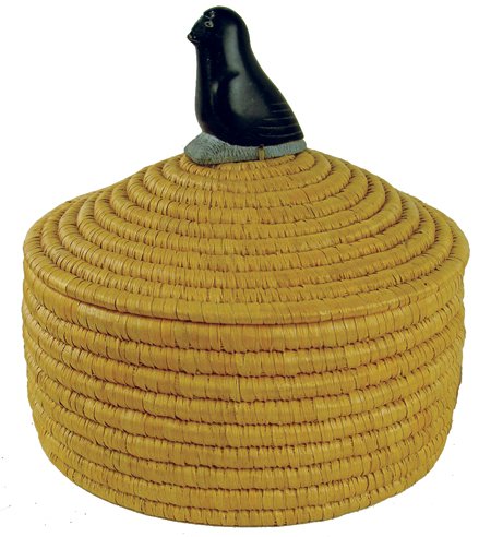 Eskimo Basket: Mid/Late 1900s, Lidded, woven seagrass basket with carved soapstone bird handle. Very good condition, but the birds nose is scratched. 9-1/2" x 10"
