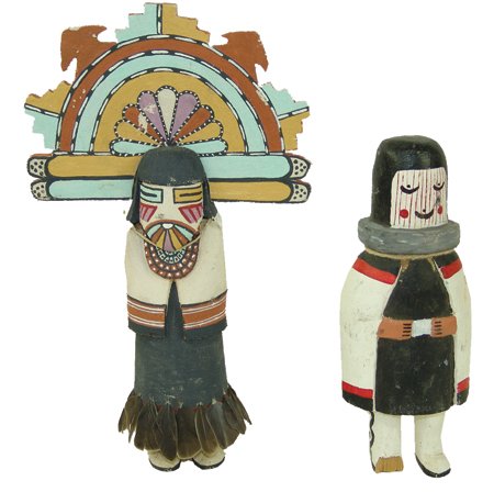 2 Hopi Katsina Carvings: Mid/Late 1900s, Pair of similar hand carved and painted cottonwood root toy dolls, one larger with a tabletta headdress. Good condition, but one kachina has a broken foot. 8-1/2" x 5"