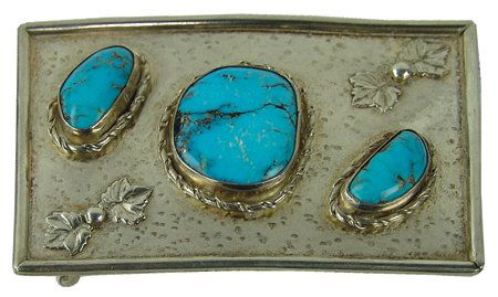 Navajo Belt Buckle: Late 1900s, Original design rectangular all-silver belt buckle with three bright blue turquoise stones; marked "Sterling," but has no hallmark. Very good condition. 2-1/2" x 3-3/4"