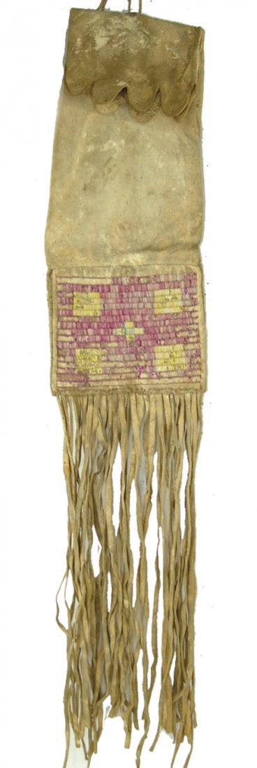 Plains Quilled Pipebag: Late 1800s, Great old sinew sewn buckskin pipe/tobacco bag with 2-sided fully quilled bottom panel. Very good condition, intact, but has much quill loss/damage. 19" + 17" fringe x 6-1/2"