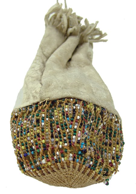 Klamath Basketry Bag: Early 1900s, Small rare white buckskin drawstring bag with beaded and twined body and a bottom of traditional basketry. Good condition, with minor flaws. 6" x 4"