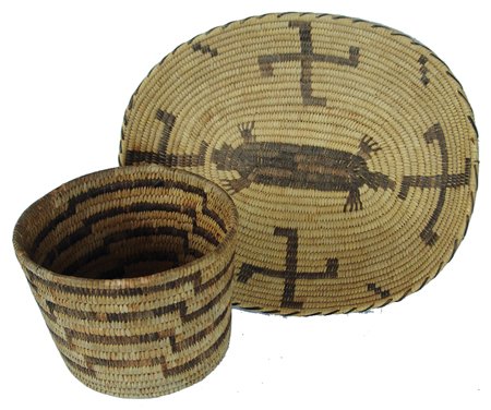 2 Papago Baskets: Ca. 1970s, A large oval tray with lizard and whirling log figures, in very good condition. Plus a cylinder basket with stepped bands in good condition. 2" x 15-1/2" x 13" and 6" x 8"