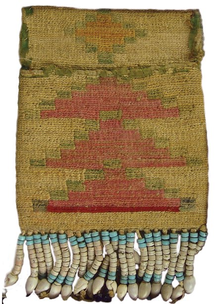 Nez Perce Cornhusk Pouch: Ca. 1930s, Unique two-sided woven cornhusk flap bag with dyed husk designs and shell and beaded fringe. Good condition, with some worn edges. 7" x 5"