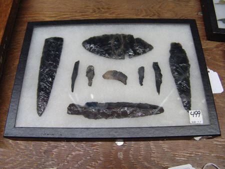 Artifact Collection: Various Ages, Framed collection of 8 black obsidian stone blades/tools, all with some type of repair. Varied