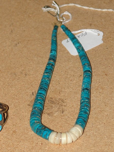 Navajo Necklaces: Classic graduated carved turquoise jacla necklace with shell corns at the bottom. 14"