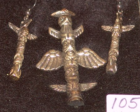 NW Coast Earrings and Pendant Set: Unique Northwest Coast cast silver earrings and pendant set, all done in totem poles. Very good condition. Tallest 2-3/8"