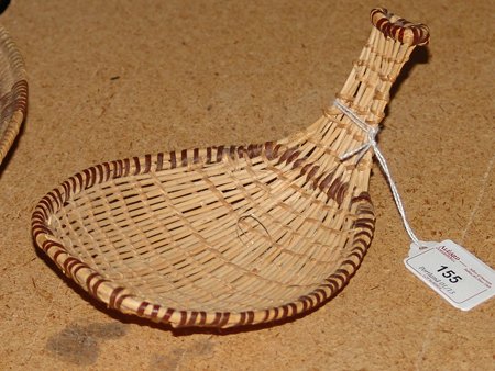 Paiute Basket: Mid 1900s, Small woven basketry seed scoop with handle and red fern trim. Very good condition. 4" x 6-3/4" x 4-1/2"