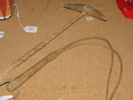Quirt and Horn Wand: 1970s, Pair of braided rawhide items; one quirt and one horn wand. Both very good condition. club 15"