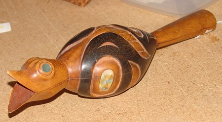 NWC Rattle: Beautiful hand carved northwest coast bird rattle with abalone inlays. Very good condition. 13"