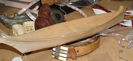 NWC Canoe: Hand carved northwest coast white cedar unpainted Tsimshian toy canoe. 5" x 20"
