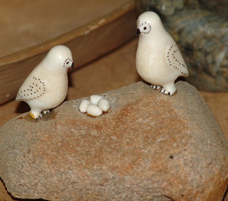 Eskimo Sculpture: Ca. 1960, Eskimo whale bone and ivory sculpture showing two ptarmigan and four eggs. Very good condition.