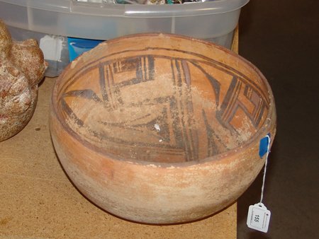 Anasazi Pottery Bowl: Beautiful old Anasazi pottery bowl with black and red on yellow interior design. In as-found, intact condition, with a rim chip and shows plenty of use on the inside. 5-1/2" x 10-1/2"