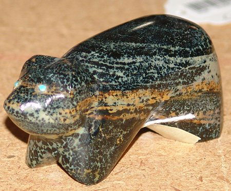 Zuni Stone Fetish: Late 1900s, Hand carved Zuni stone bear fetish with turquoise inlaid eyes. Very good condition. 1-1/2" x 3-1/4"