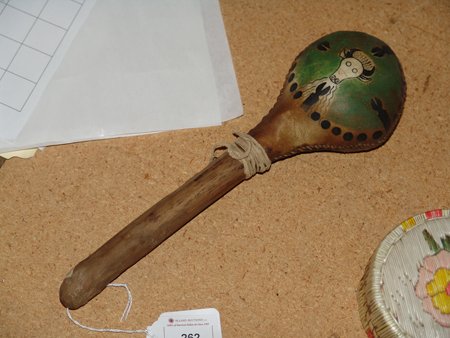 Plains Rawhide Rattle: Ca. 1970s, Hand crafted Plains rawhide rattle. 11"