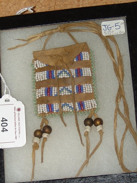 Beaded Bag - Small Frame: Late 1900s, Miniature beaded buckskin medicine bag in very good condition.