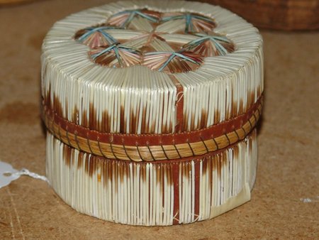Quilled Basket: Fine Ojibway quilled birch bark basket with a beautiful floral top. Good condition, with some missing or damaged quills 2-1/2" x 3-1/2"