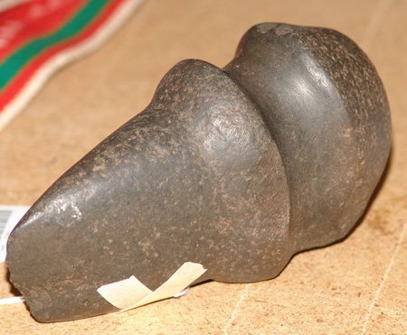 Hohokam Pioneer Axe: Ca. 1200-1500 A.D., Excavated Hohokam three-quarter groove Pioneer axe. The blade has a couple small chips, otherwise good condition. 5-1/2" x 3"
