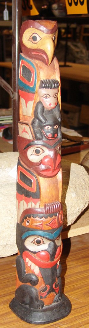 NWC Totem Pole: Very nice hand carved and painted northwest coast totem pole with at least six figures. Very good condition. 20-1/2" x 4-1/2" x 3-1/2"