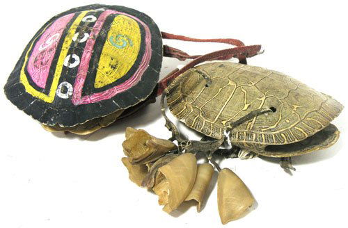 Turtle Rattles: Early 1900's A pair of shell hand rattles, one painted from the southwest and with cowry shells, the other from the Plains, more plain and with dew claws. Approx. 5" x 4" each