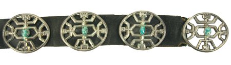 Navajo Concho Belt: Ca. 1970s, Classic Yei(?) figured sand cast all-silver concho belt, the 7 segments and matching buckle all set with a single turquoise stone. Very good condition, one stone is cracked. 41-1/2" long, c
