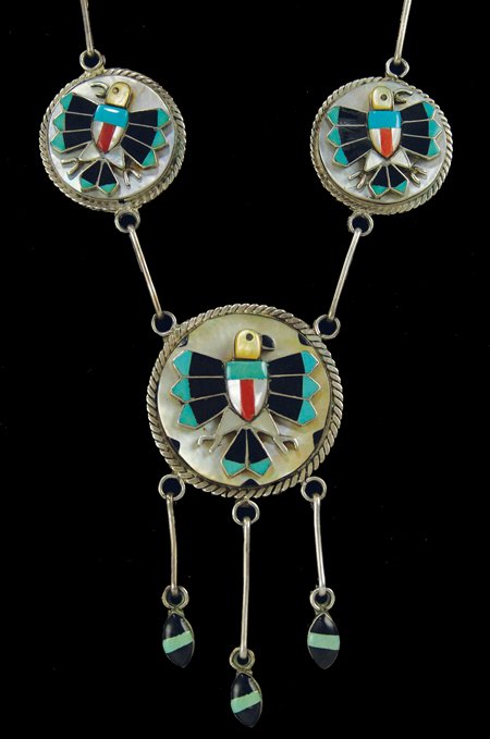 Zuni Inlay Necklace: Ca. 1960s, Classic, vintage, three-segment all-silver necklace with appliqué inlaid eagle figures on shell ground, on a handmade chain. Very good condition. 34" long, drop 2-1/2" x 2-1/4" + 2-1/4"