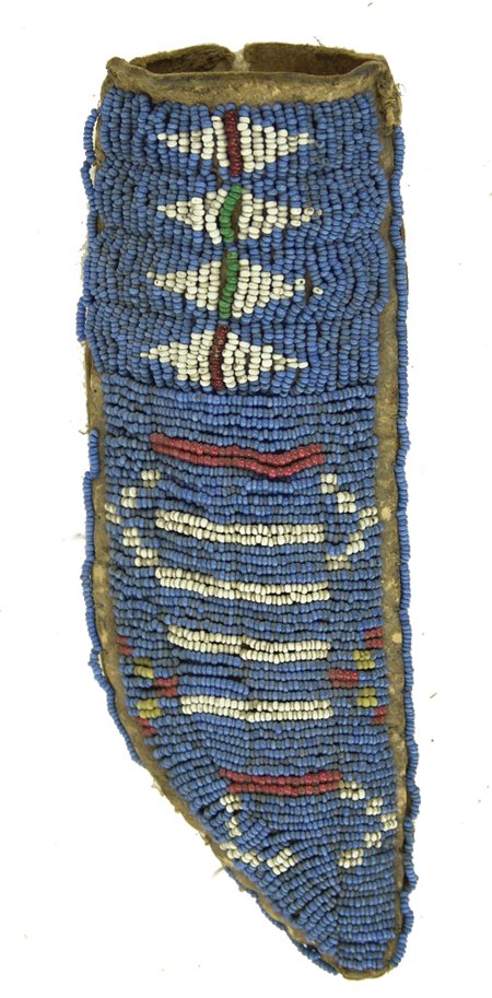 Cheyenne Beaded Sheath: Ca. 1900, Classic old buckskin covered shaped rawhide knife sheath with sinew sewn and lazy stitch beaded design on front. Very good condition, some bead loss/damage. Ex. Baskerville Collection 7-1/4"