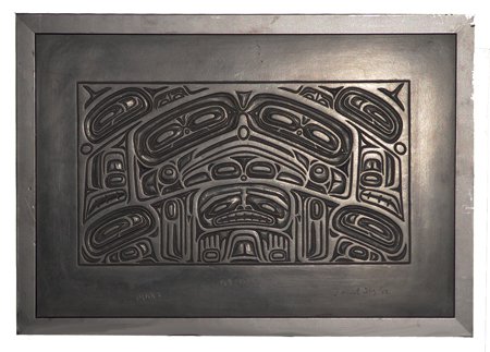 NW Coast Panel - J. Ilig: Ca. 2012, Limited edition (#149/1500) carved faux argillite transformation panel "Bear I." Over one inch thick, a heavy piece. Very good condition 13-1/4" x 19"