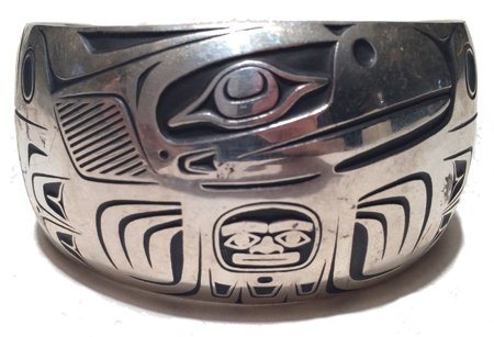NW Coast Bracelet - Barry Herem: Mid 1900s, Stunning NW Coast all-silver cuff bracelet done with traditional cast-silver NW Coast symbols. Hallmarked. Great condition. 7" + 1-1/4" x 1-5/8"