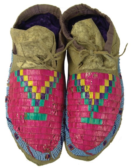 Sioux Quilled Moccasins: Early 1900s, Striking pair of sinew sewn and lazy stitch beaded and quilled hard soled moccasins done in a bright "Fort Berthold pink" color. Very good condition, minor quill/bead loss or damage in so