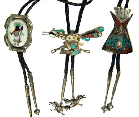 3 Bolo Ties: Ca. 1970s, Three all-silver bolo ties: a Navajo chip inlay tepee by Singer Bros., a Zuni inlay roadrunner, and a Zuni inlay devil dancer. All in very good, usable condition. Longest 41", bolo 2" x 1-1