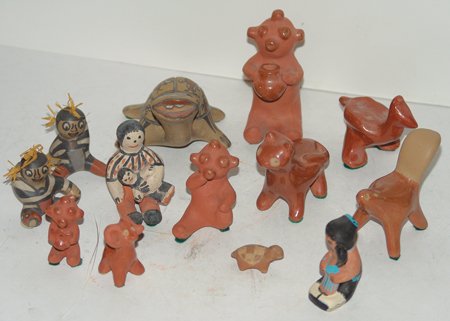Pueblo Pottery Lot: Ca. 1960 - 1990, Box lot of mostly Santa Clara and San Ildefonso pottery figures, three by Margaret and Luther - 13 pieces in all. All in good to very good condition. Small 3/4" x 1-1/2", Lg 3" x 4" x