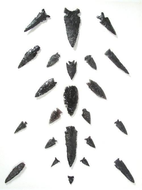 Artifact Frame: Framed collection of huge black obsidian arrowheads, spear points, and other tools. 23 pcs Various Ages