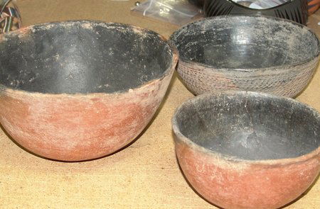 3 Anasazi Pots: Prehistoric, Two Gila redware and a corrugated blackware pot. All in good condition, some regluing. Largest 4-3/4" x 9-1/2"