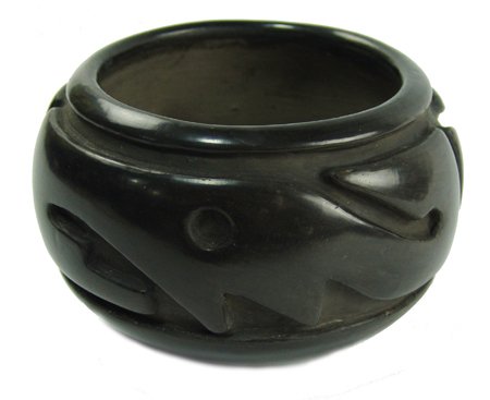 San Ildefonso Pottery Jar - Margaret: Mid 1900s, Classic deep carved pottery bowl done in classic-style, signed Margaret. Very good condition, minor surface scratches. 3-3/4" x 5-3/4"