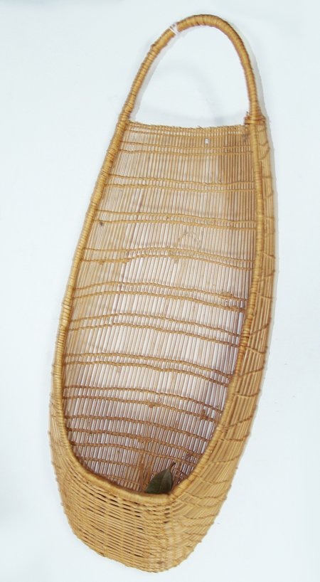 Yurok Doll Cradle - Ella Johnson: Ca. 1975, Very fine hand woven toy cradle done in traditional openwork style. Like new condition. Ex. Herb Puffer Collection 17-1/2" x 7"