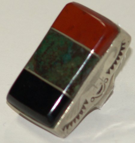 Man's Inlay Ring - Sloan: Ca. 1970s, Large silver hollow work ring with raised inlays of turquoise and carnelian with simple designs etched and stamped into the sides. Good condition Size 12