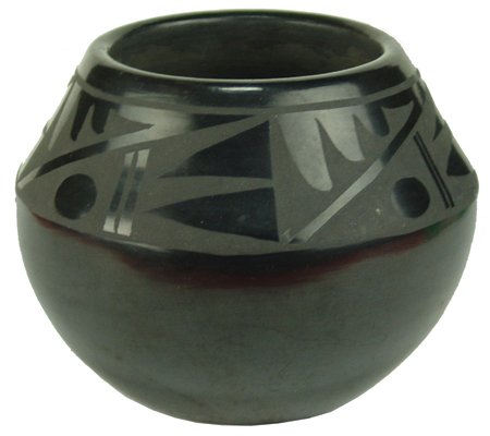 San Ildefonso Pottery Bowl - Terisita Naranjo: Ca. 1970s, Classic shaped black-on-black pottery jar with traditional motif. Very good condition. 3-3/4" x 4-1/2"