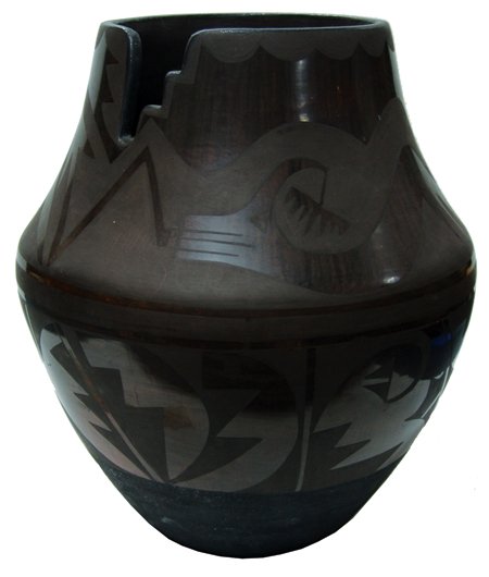 Santa Clara Pottery Jar - Teresita Naranjo: Ca. 1960s, Very large and sturdy black-on-black pottery jar with sculptured rim and Avanyu serpent figure. Very good condition, signed "Apple Blossom." 12-3/4" x 10"