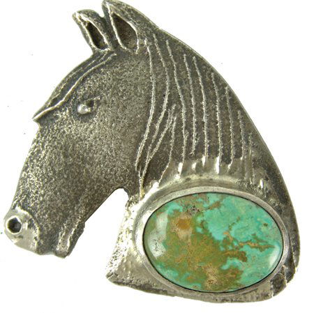 Santo Domingo Pendant - Anthony Lovato: Early 2000s, Fine original design all-silver tufa cast pin/pendant in horse head form with a large green turquoise stone. Very good condition. 2" x 2"