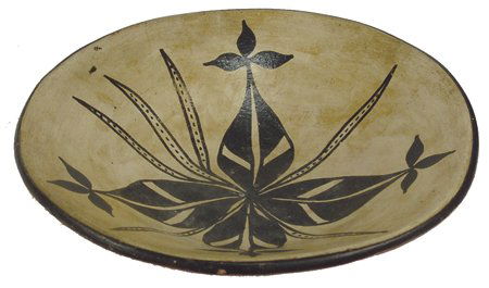 Cochiti Pottery Dish: Ca. 1920, Great old low-profile dish with simple black floral design and red bottom. Good condition, shows much use, great patina. 2-1/4" x 9-1/4"