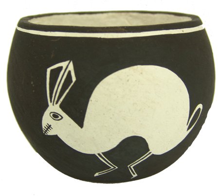 Acoma Pottery Bowl - Emma Lewis: Ca. 1980s, Unique reverse design pottery bowl with rabbit figures. Very good condition. Emma is Lucy's oldest daughter. From the Herb and Peggy Puffer Collection, Folsom, California. 3-1/4" x 4"