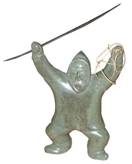 Eskimo Stone Carving: Ca. 1970s, Beautiful hand carved green soapstone figure of an ecstatic hunter with harpoon and cord. Very good condition. 8-1/4" x 6" x 2"