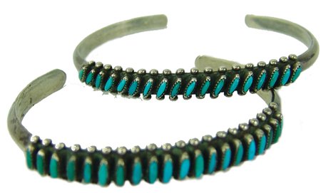 2 Zuni Bracelets: Ca. 1960s, Pair of similar vintage turquoise and silver needlepoint bracelets with great patina. Very good condition. 4-1/2" + 1-1/4" x 1/4"