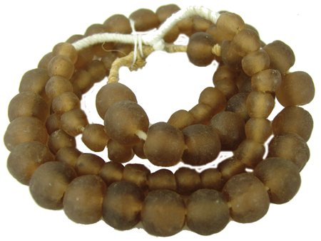 Antique Tradebeads: Mid 1900s, Two strands of hard-to-acquire root beer colored seaglass tradebeads, one strand small, the other larger-sized. Very good condition. 26"